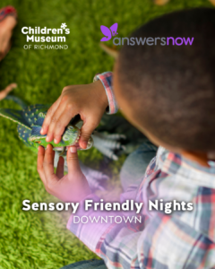 Child playing with a green dinosaur toy on a green carpet at a Sensory Friendly Nights Downtown event.