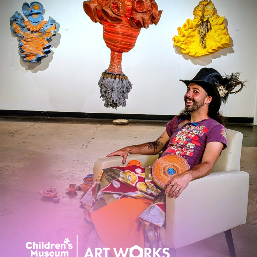 Children's Museum of Richmond: Man seated with art installations. Colorful and creative exhibit, Untitled-design-21.png